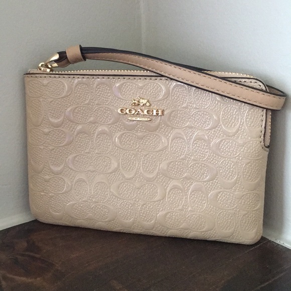 Coach Handbags - Coach platinum signature C debossed wristlet NWT